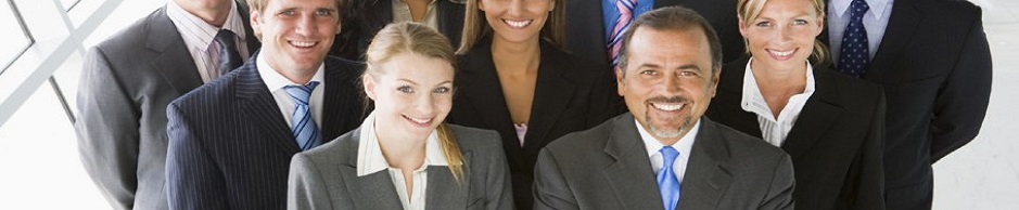 smiling-business-team-showing